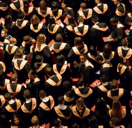 college graduates looking forward, while some of them looking the otherway