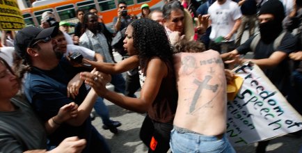 Arguments breaking out between white and black Americans during a National Socialist Movement rally in LA in 2010.