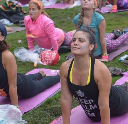 Women doing yoga outside in Atlanta.