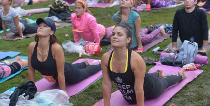 Women doing yoga outside in Atlanta.
